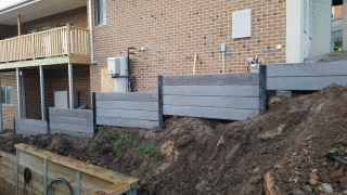 Retaining Wall with Powdercoated steel posts concrete sleepers in Lilydale